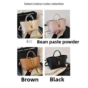 Selection of large capacity bucket bags in beige, pink, brown, and black lychee texture
