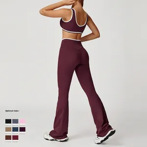 Women's burgundy high waist yoga set with white contrast trim and open back sports bra