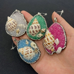 Natural shell and crystal stone drop pendants with rhinestone edges in four colors