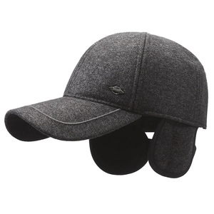Dark grey winter baseball cap with ear flaps and wool texture for outdoor warmth