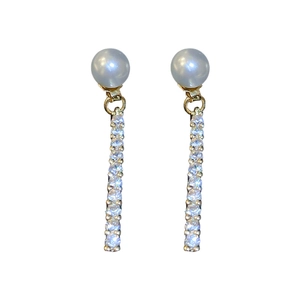 Elegant gold plated pearl drop earrings with sparkling cubic zirconia on white background