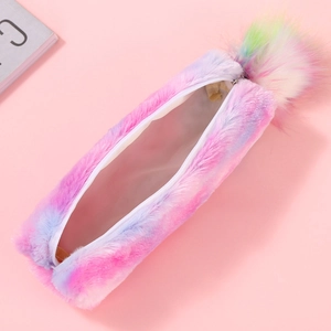 Macro detail of rainbow tie-dye plush pencil case with soft texture and fluffy pompom zipper
