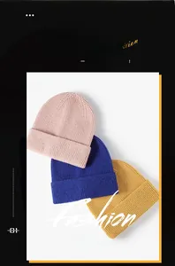 Three colors of ribbed knit beanies in pink, blue, and yellow with folded cuff details