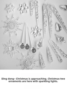Macro detail of transparent acrylic snowflake and icicle ornaments for Christmas trees