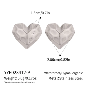 Detailed view of heart stud earrings showing 1.8cm x 2.06cm size and faceted steel finish