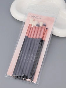 Detail of 7-piece RC fiber eye makeup brush set with rose gold ferrules and PVC packaging