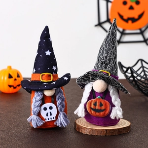 Halloween gnome plush dolls with wizard hats and pumpkin motifs on dark rustic surface