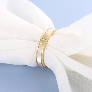 18K rose gold plated stainless steel ring featuring white shell inlay and three small gems