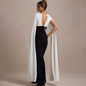 Elegant sleeveless backless V-neck maxi dress with long white cape and black拼接 design