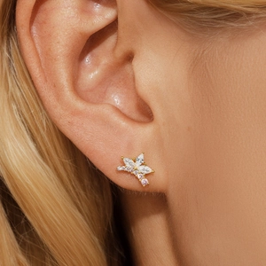 Close-up of S925 sterling silver star stud earring with opal and pink crystal inlay