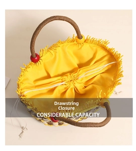 Detail of woven straw bucket bag with drawstring closure and colorful wooden bead charms
