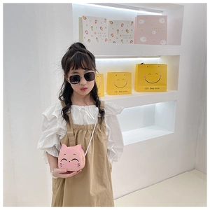 Cute pink cat face cartoon crossbody bag for kids with white braided shoulder strap