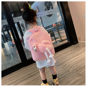 Detail of pink flamingo plush backpack with 3D legs and HSLP embroidery for girls