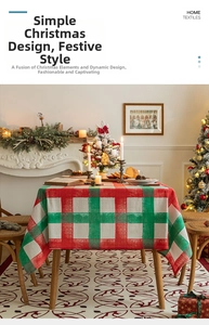 Detail of red and green plaid Christmas tablecloth with woven texture on a wooden table