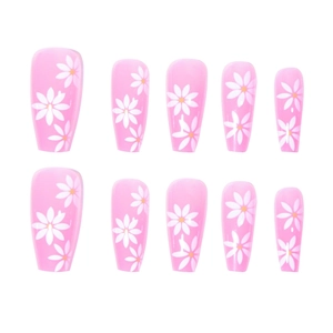 Pink coffin fake nails featuring white sunflower daisy floral patterns in a 10-piece set