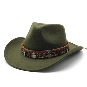 Close-up of military green wool fedora hat with braided band and vintage metal coins