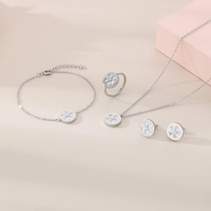 Silver flower jewelry set with sparkling rhinestones including necklace and ring