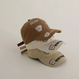 Kids baseball caps with embroidered bears in brown, cream, and khaki cotton fabric