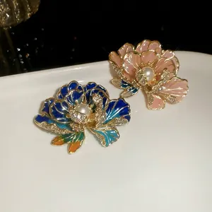 Exquisite French enamel flower brooches with central white pearl and sparkling rhinestones