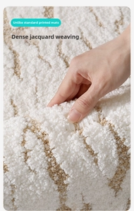 Close-up of thick jacquard floral bath mat showing soft high-density plush texture