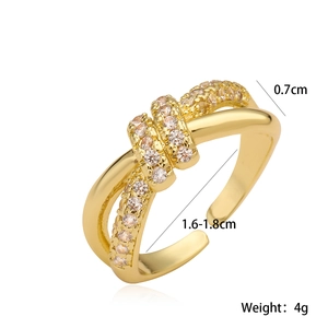 Detail view of 18K gold plated cross knot ring with micro-set zircons and size dimensions