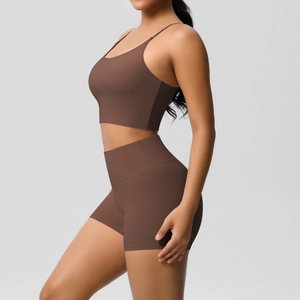 Two-piece coffee brown yoga set with sports bra and high-waisted seamless biker shorts