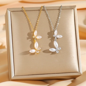 Titanium steel butterfly necklace with pearls and zircon in gold and silver finishes