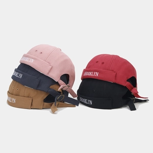 Five colored cotton Miki hats featuring Brooklyn embroidery and metal back buckles