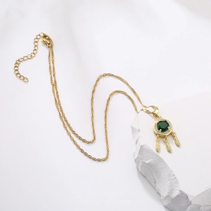 18K gold plated dreamcatcher necklace featuring a green zircon gemstone and feather charms