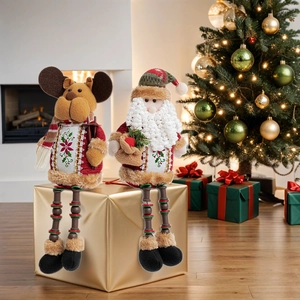 Plush Christmas Santa and Reindeer dolls with long beaded legs on golden gift box