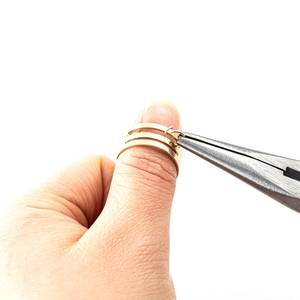 Golden ring tool for opening jump rings used for DIY jewelry making and bracelets