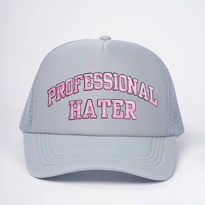 Detail of grey trucker hat featuring pink Professional Hater embroidery and mesh panels