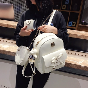 Three-piece cream white bow backpack set with crossbody bag and bear charm accessories