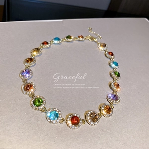 Fashionable golden chain necklace featuring vibrant multi-colored round gemstones for women