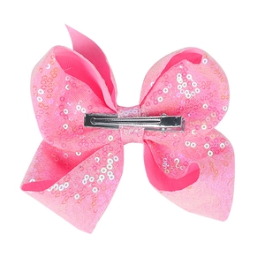 Pink sequin bow hair clip for girls with silver metal alligator clamp on white background