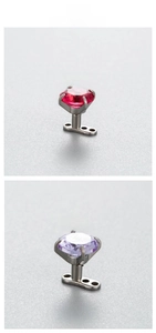 Detail of 6mm square zircon microdermal anchor with dark red and lavender stones