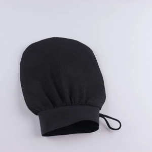 Exfoliating bath glove in black with textured fabric and elastic wrist for deep cleaning