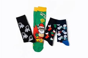 Detail view of festive cotton crew socks featuring pug dogs, snowmen and Christmas patterns