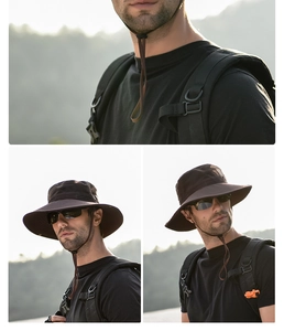 Detail of dark brown outdoor sun hat with breathable mesh top and adjustable wind strap
