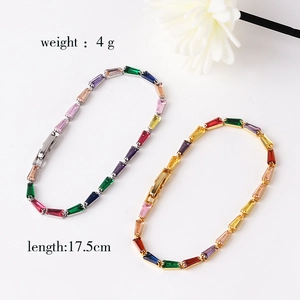 Close-up of rainbow zircon tennis bracelets in gold and silver showing 17.5cm length and 4g weight