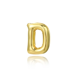 Close-up of golden letter D balloon pendant with polished 18K gold plated metal texture