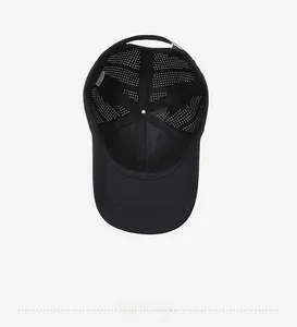 Detail of black baseball cap interior with laser-cut ventilation holes and reinforced seams
