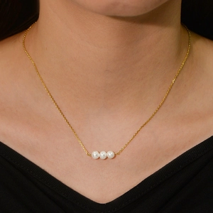 Elegant 925 silver necklace with three natural white pearls on a minimalist gold chain
