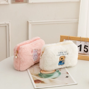 Cute plush makeup bags with bear and rabbit embroidery, featuring pearl zipper heads