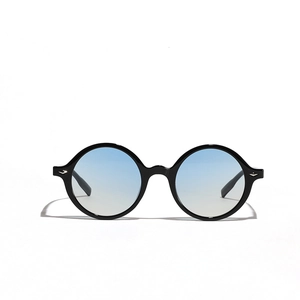 Retro oversized round sunglasses in black frame with light blue gradient lenses