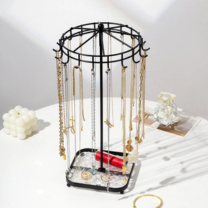 Rotating black metal jewelry stand with 18 hooks and square acrylic base tray for necklaces