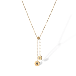 Macro shot of gold plated titanium steel Y-necklace with Roman numerals and zircon stones