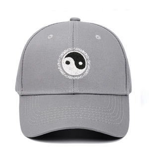 Detailed embroidery of Tai Chi Yin Yang symbol and Swimming text on gray baseball cap