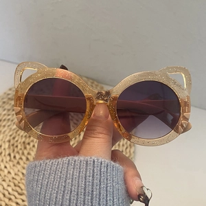 Kids round cat ear sunglasses with orange gradient lenses and gold sequins