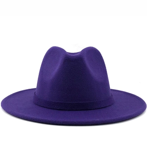 Detailed view of deep purple wool felt fedora hat with matching ribbon band decoration